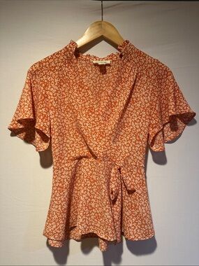 Floral Wrap Peplum Top in Orange